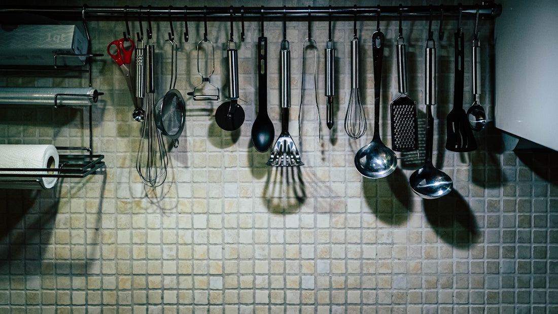 a rack full of kitchen utensils